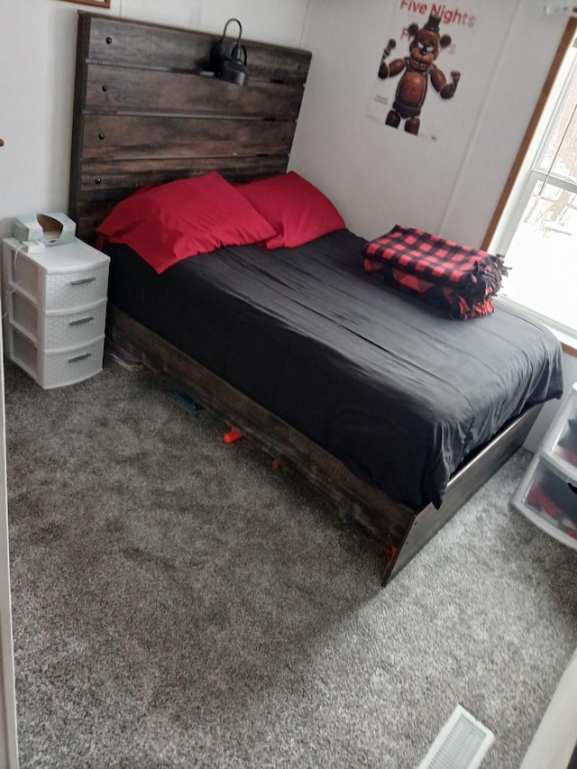 bedroom featuring carpet