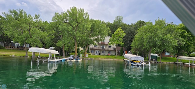 exterior space with a dock and boat lift