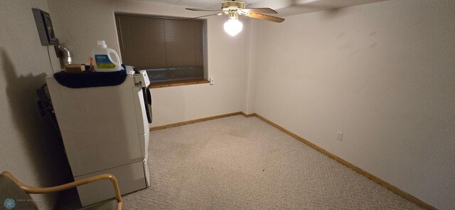 interior space with ceiling fan and baseboards