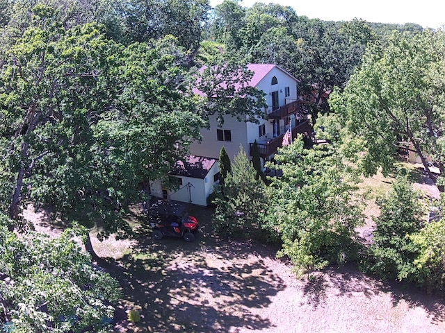 aerial view with a wooded view