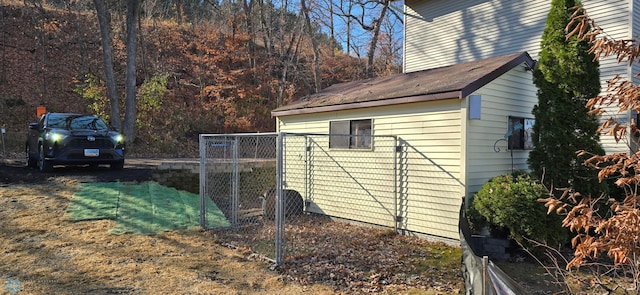 view of home's exterior featuring an outdoor structure