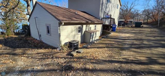 view of home's exterior with central AC unit