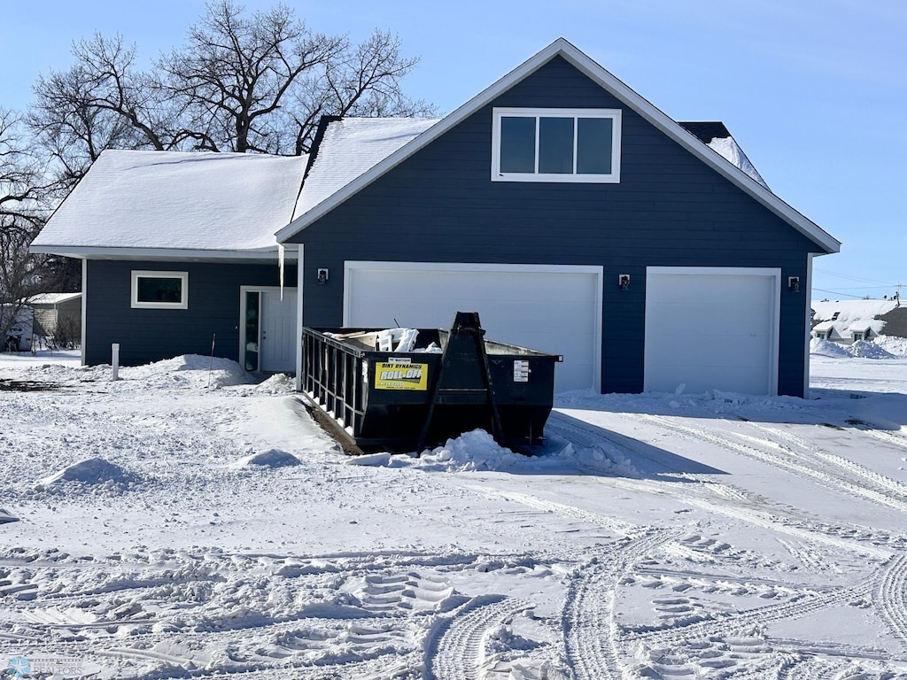 view of front of property featuring an attached garage