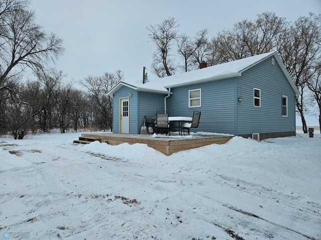 view of snow covered property