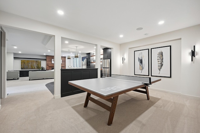 game room with light colored carpet