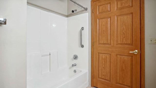 bathroom with shower / tub combination