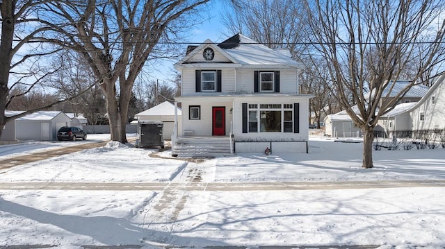 view of front of property featuring a detached garage