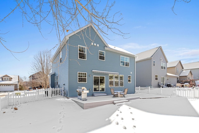 view of snow covered property