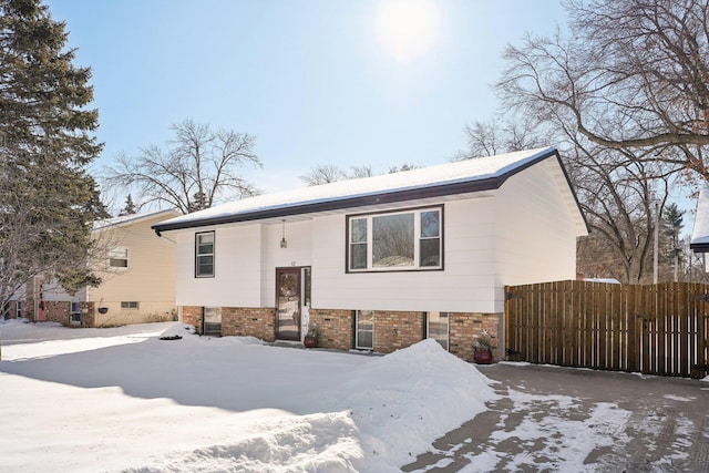 view of front of home with brick siding