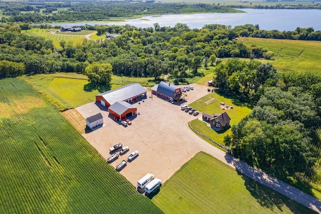 birds eye view of property featuring a water view and a rural view