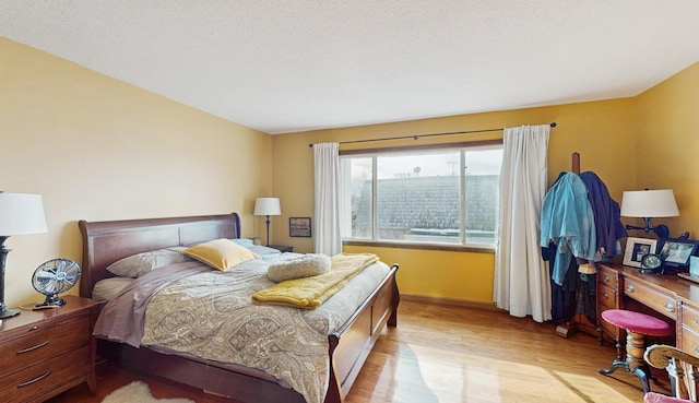 bedroom featuring light wood-type flooring