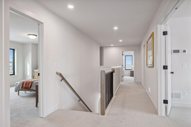 4718 Ordell Trl N, Stillwater, MN 55082 - hall featuring an upstairs landing, light colored carpet, recessed lighting, and baseboards