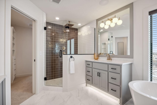 4718 Ordell Trl N, Stillwater, MN 55082 - full bathroom with a shower stall, vanity, baseboards, a freestanding bath, and recessed lighting