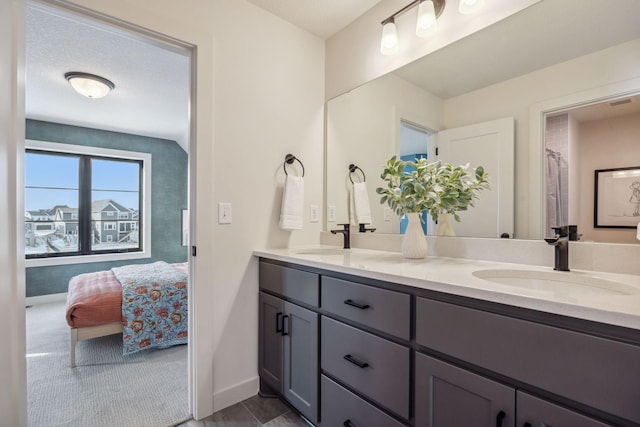 4718 Ordell Trl N, Stillwater, MN 55082 - ensuite bathroom with baseboards and double vanity
