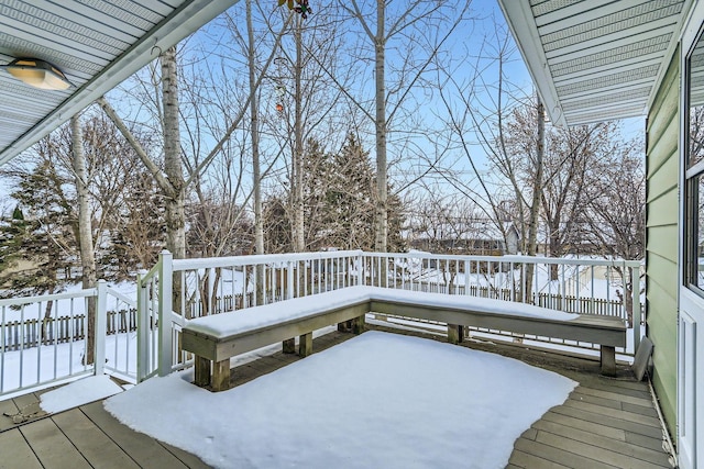 view of snow covered deck