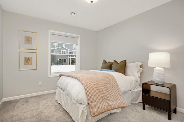 bedroom with light carpet