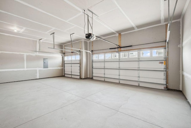 1683 Oak Creek Ct, Chaska, MN 55318 - garage with electric panel and a garage door opener