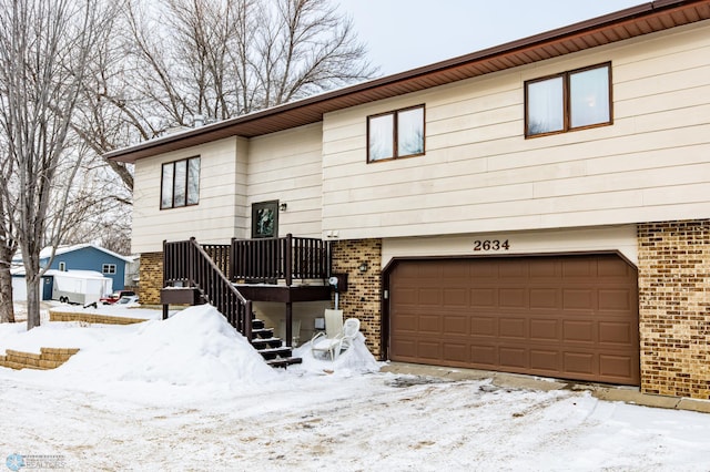 bi-level home featuring a garage