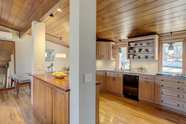 kitchen with a wall unit AC, a sink, vaulted ceiling, black dishwasher, and wooden ceiling