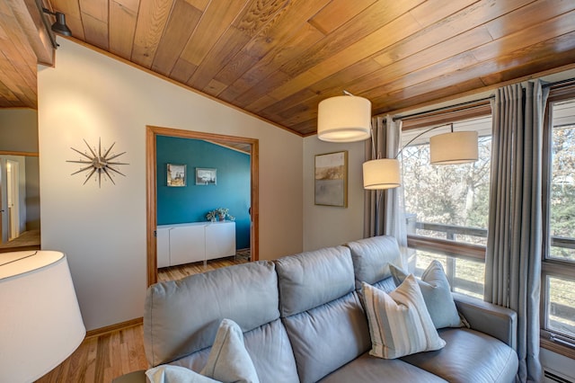 living area featuring plenty of natural light, wood ceiling, and wood finished floors