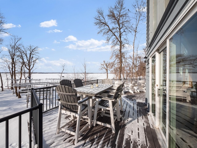 view of snow covered deck