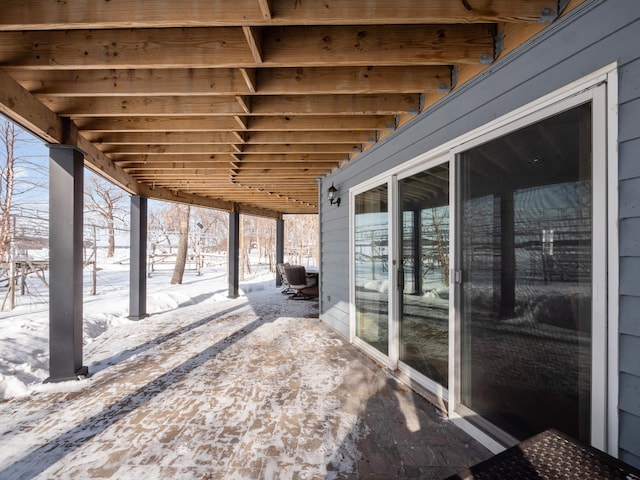 view of snow covered patio