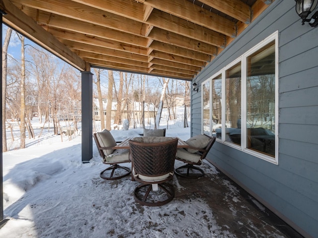 view of snow covered patio