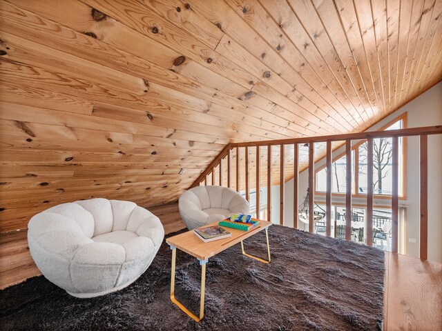 living area with wood ceiling and vaulted ceiling