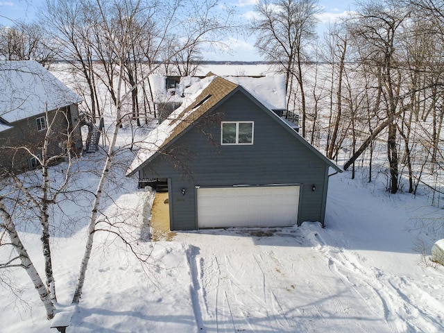 exterior space with a garage