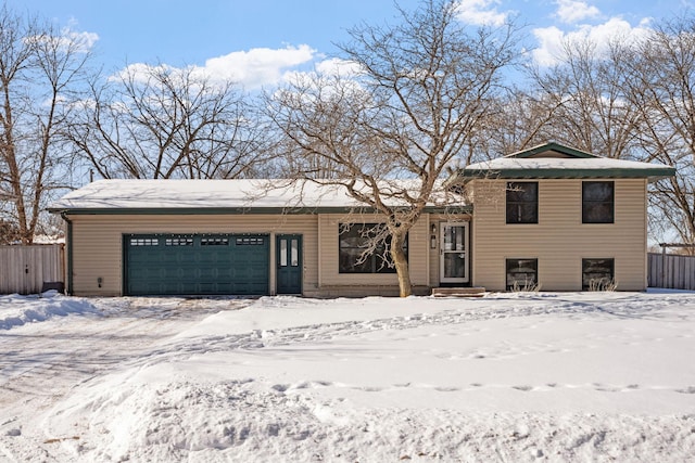 split level home featuring a garage