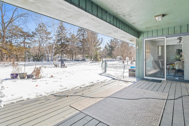 view of snow covered deck