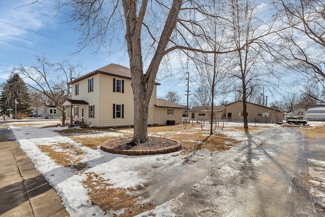 view of front of home with fence