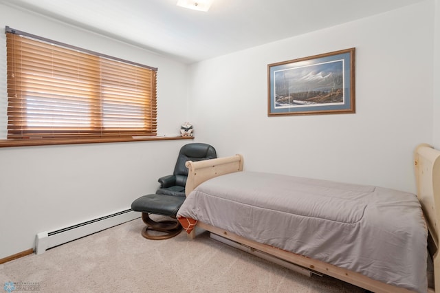 bedroom featuring carpet floors and baseboard heating