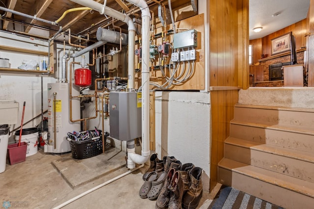 utility room with gas water heater