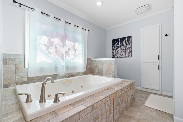 full bathroom with tile patterned floors, a tub with jets, and ornamental molding