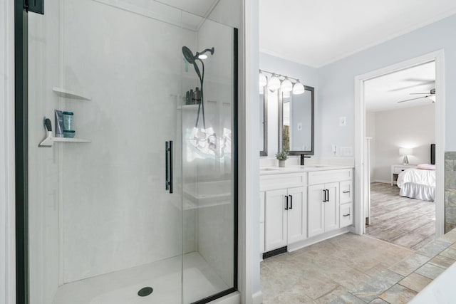 bathroom with ensuite bath, a stall shower, vanity, and a ceiling fan