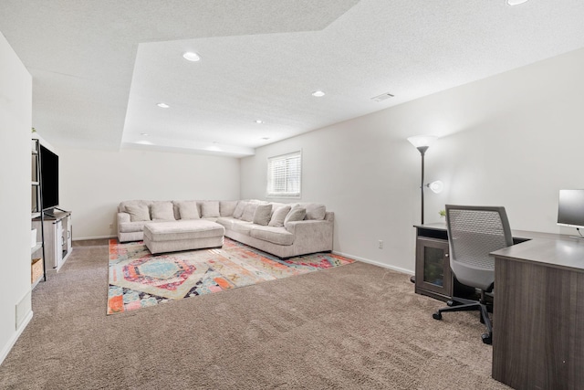 carpeted living area featuring visible vents, recessed lighting, baseboards, and a textured ceiling