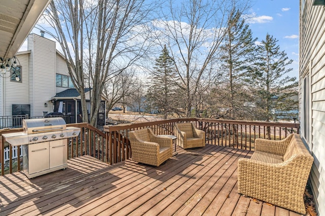 wooden terrace with area for grilling