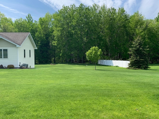 view of yard featuring fence