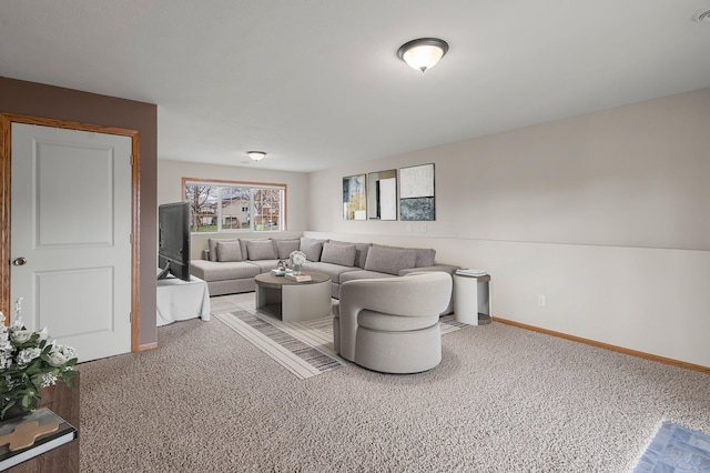 living area with carpet floors and baseboards