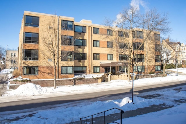 view of snow covered building