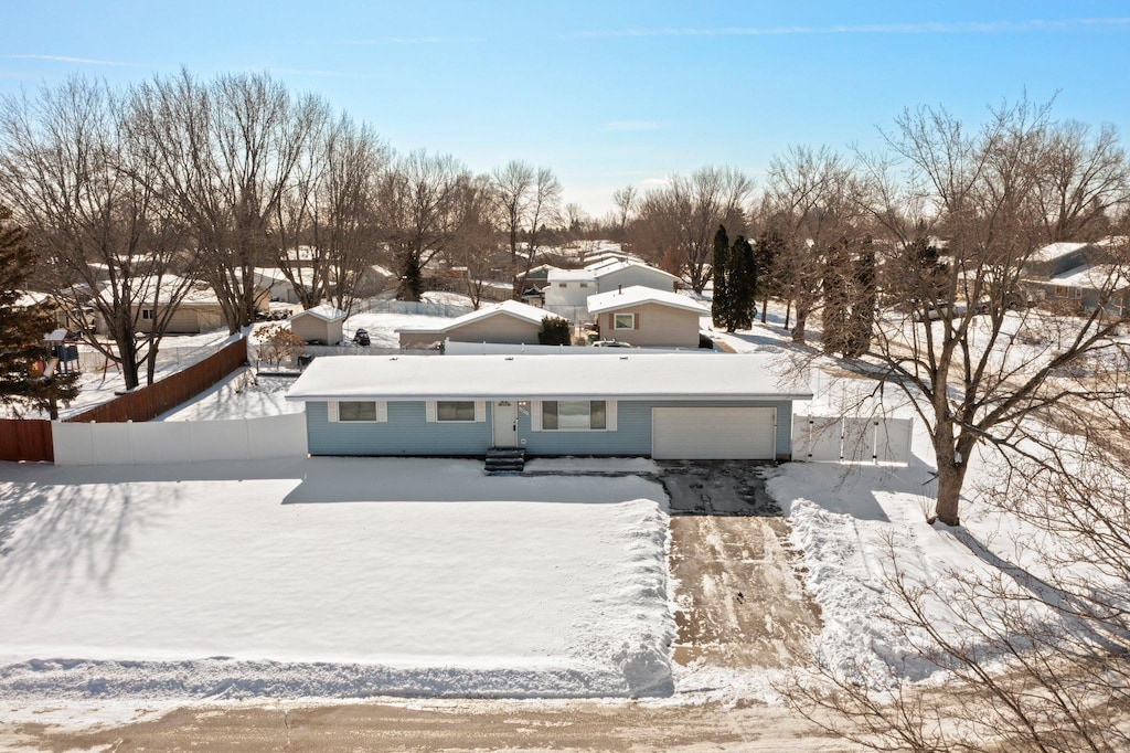 view of front of home featuring a garage