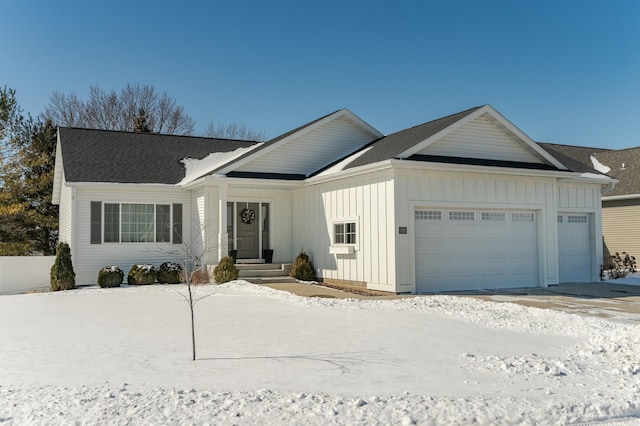 view of front of house with board and batten siding and a garage