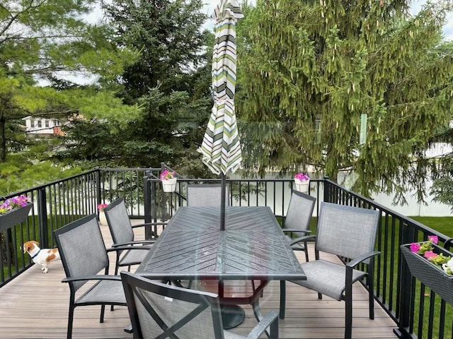 wooden deck with outdoor dining area