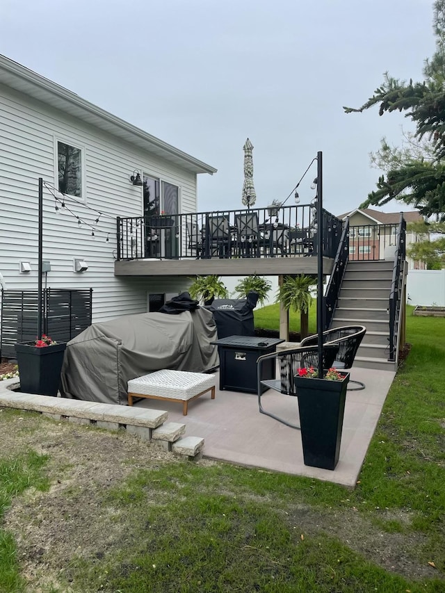 exterior space featuring a deck, area for grilling, and stairway