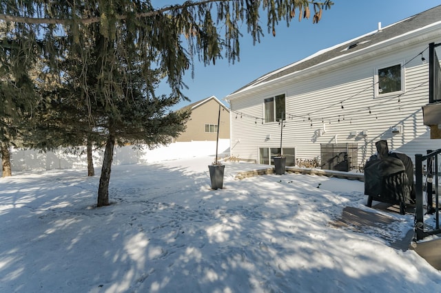 view of snow covered house