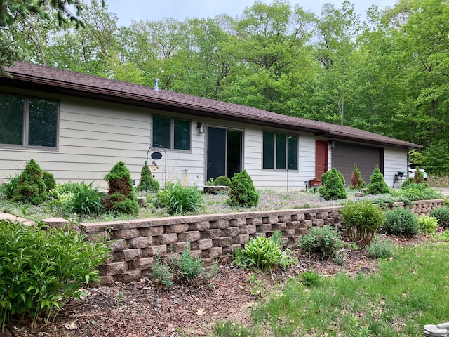 ranch-style house with an attached garage