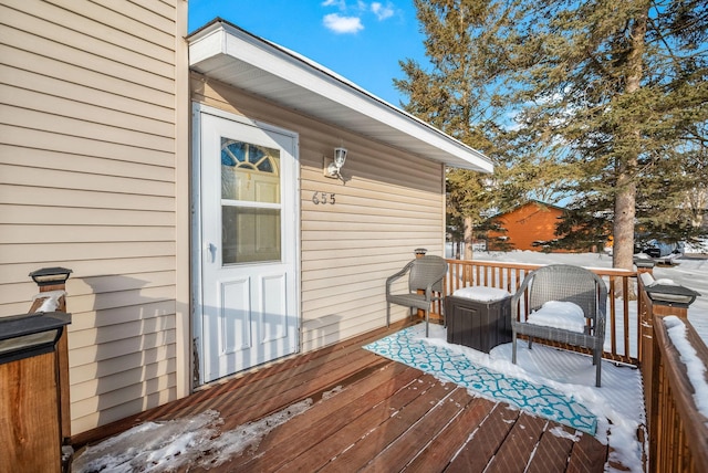 view of snow covered deck