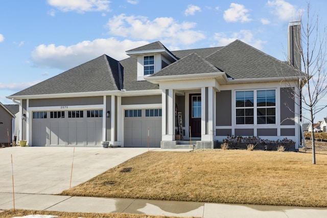 view of front of property with a garage, driveway, a shingled roof, a front lawn, and stucco siding