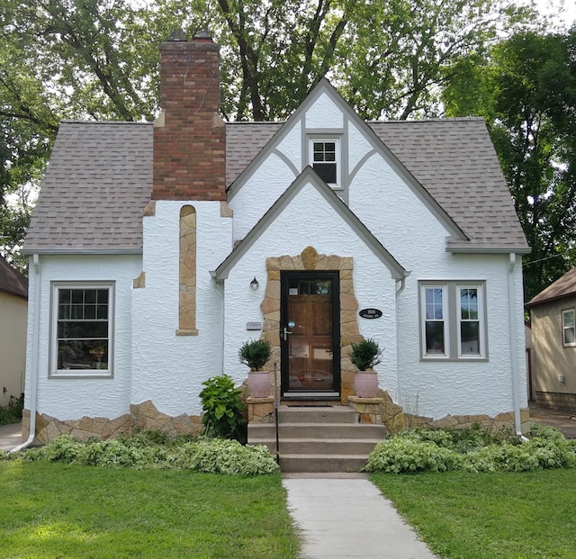 view of front of home with a front yard